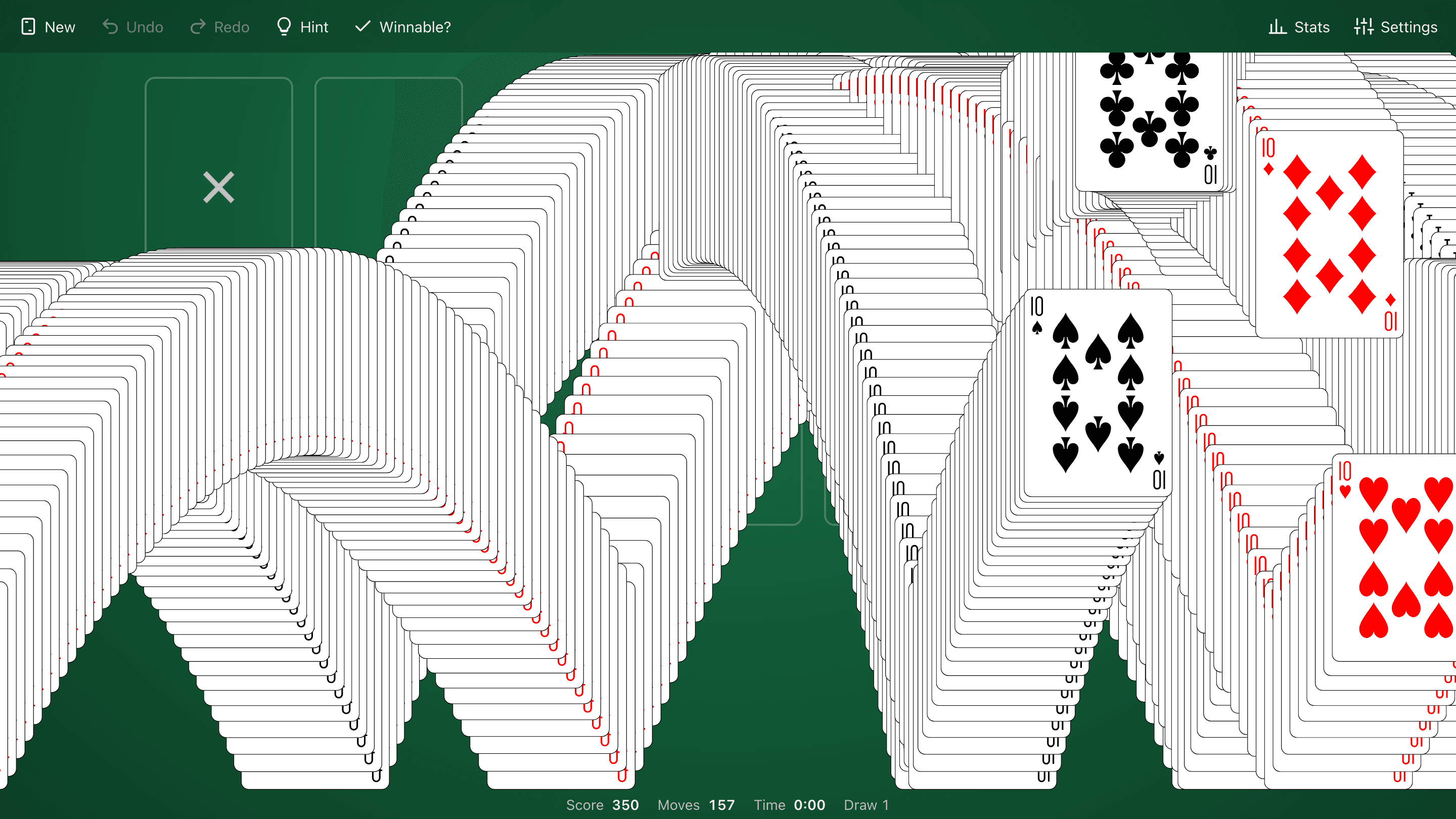 The win cascade: cards bouncing off the bottom of the screen, each leaving a trail of copies of itself across the green felt
